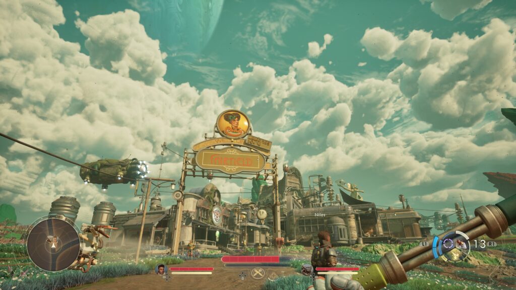 Screenshot from a video game, showing the entrance to Fairfield. The large sign has the face of a woman with a fancy hair do. Above the sign are white clouds against a brilliantly blue sky. In the gaps between the clouds can be seen the curve of a large blue planet. 